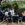 Attendees taking a break in Red Orbit chill seats enjoying sunshine.